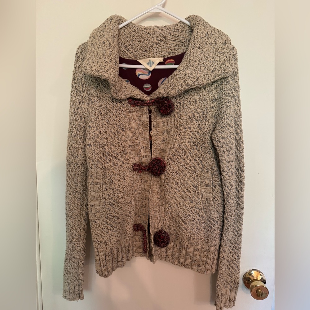 Anthrologie cute knitted jacket with pom pom